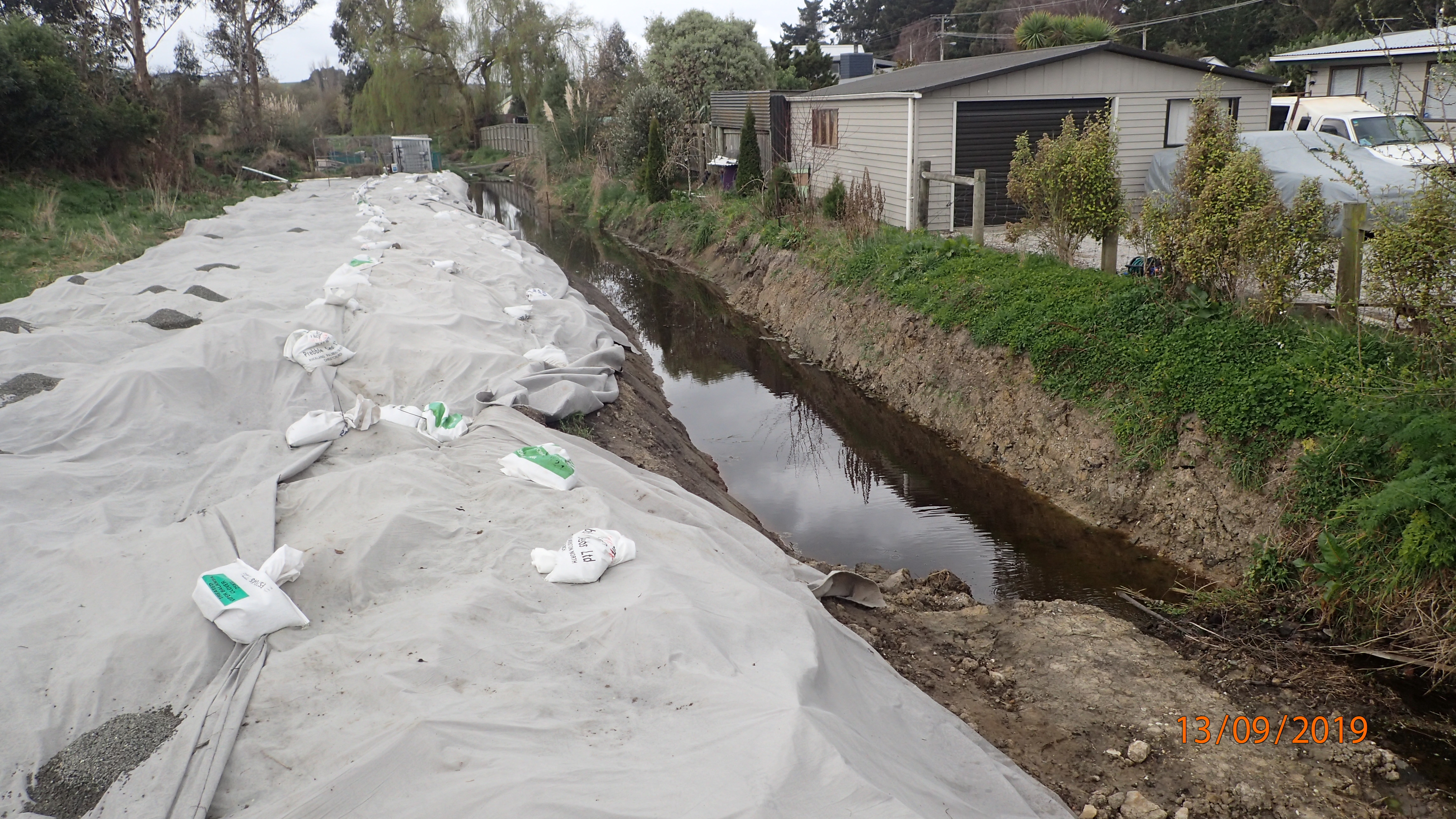 Good intentions to cover disturbed land, however no work has been done  to manage sediment from the channel itself