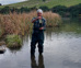 Associate Professor Marc Schallenberg examines a sediment core sample from Tomahawk Lagoon
