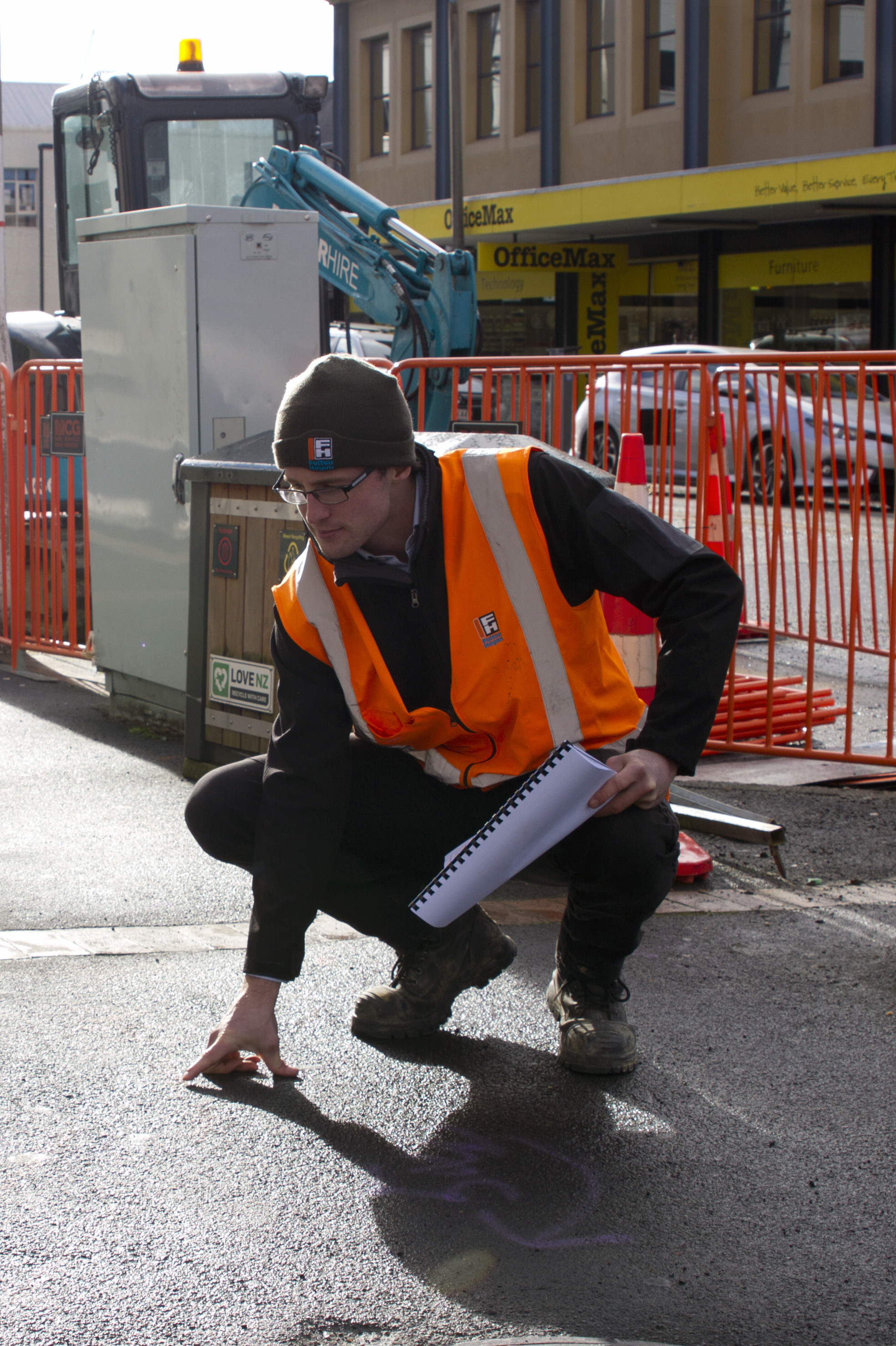 Alex Sutherland of Fulton Hogan inspects placement of markings on site, ready for the next stage of construction.