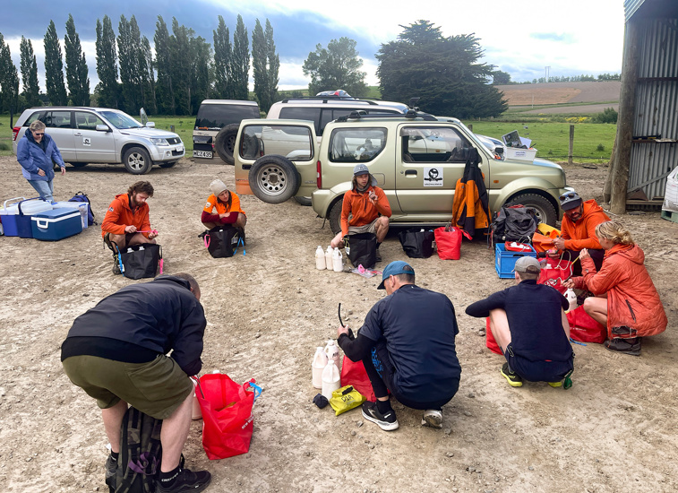 Splitting Up Gear At The Volunteer Depot On 4 Rivers Farm Before The Community Trapping Trip