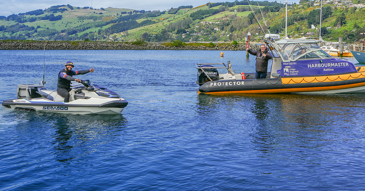 Highlander Jona Nareki giving thumbs up to ORC Harbourmaster Steve Rushbrook