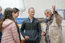 Otago Girls students and Deputy Principal Chris Richards, talking to Andrew Innes at event.