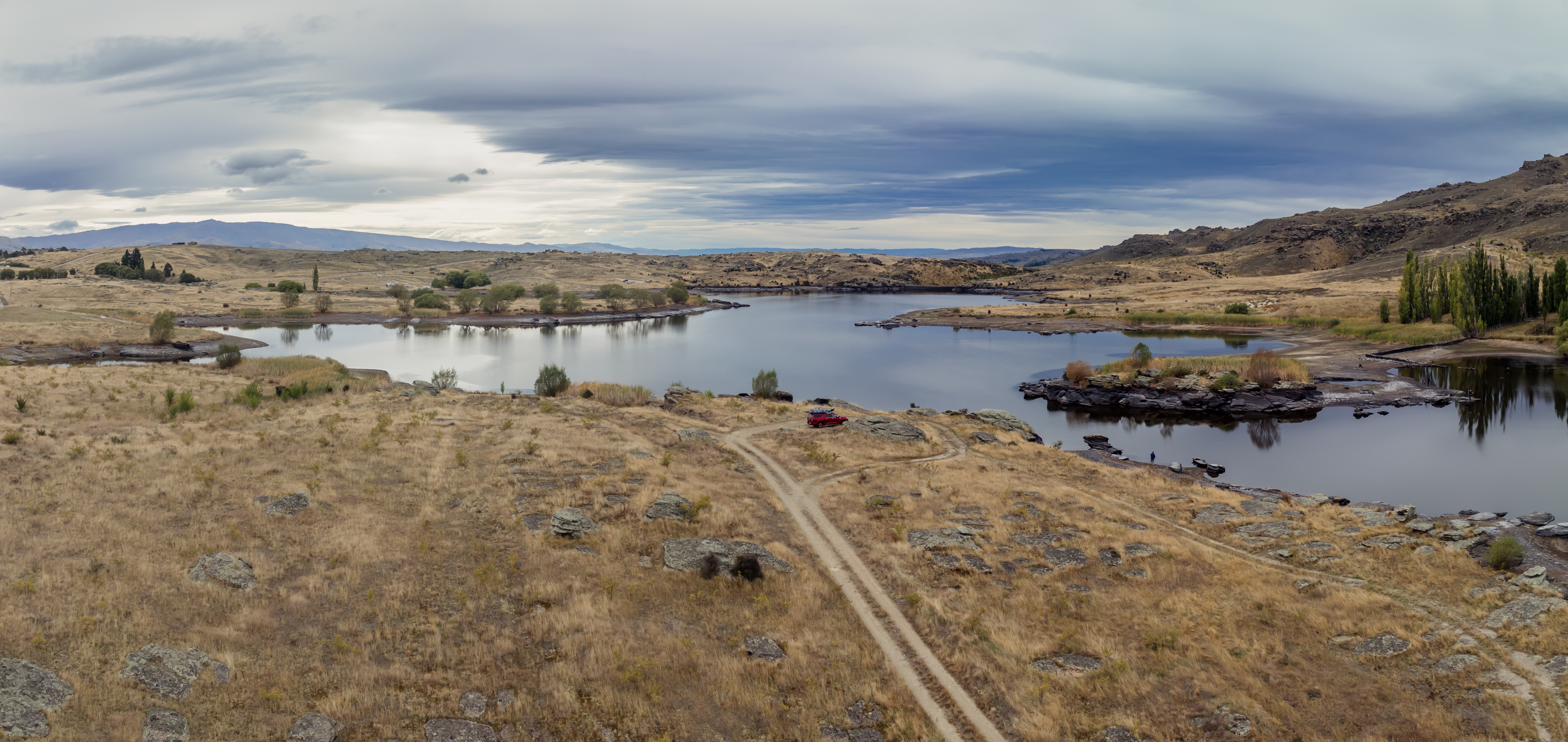 Dry Farmland And Butchers Creek Reservoir, Alexandra, Otago Adobestock 834453809