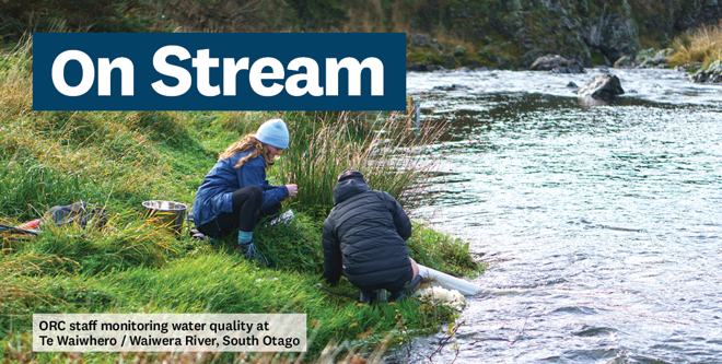 On stream banner - ORC staff monitoring water quality at Te Waiwhere Waiwere River South Otago