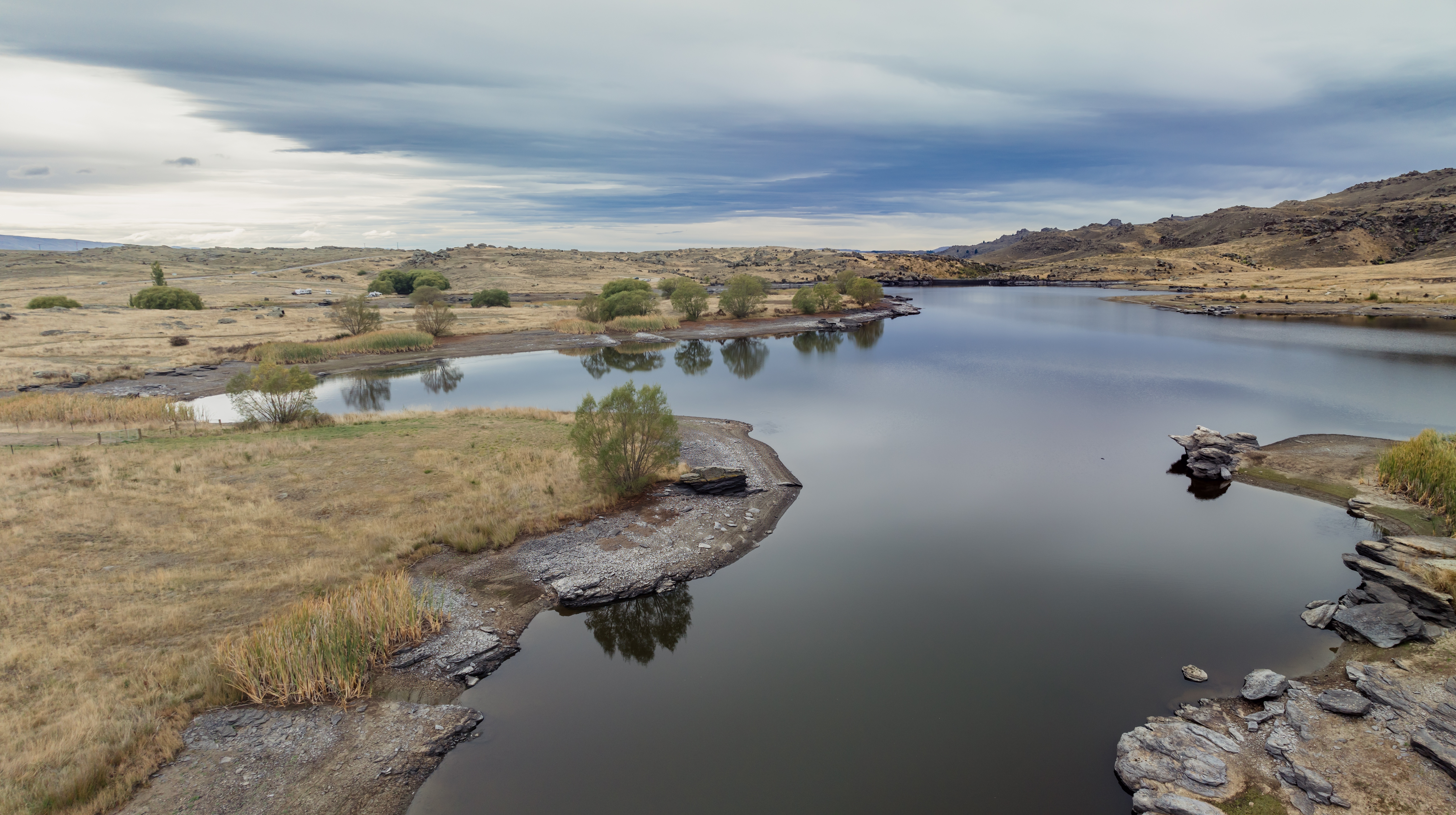 Dry Farmland And Butchers Creek Reservoir, Alexandra, Otago Adobestock 834453852